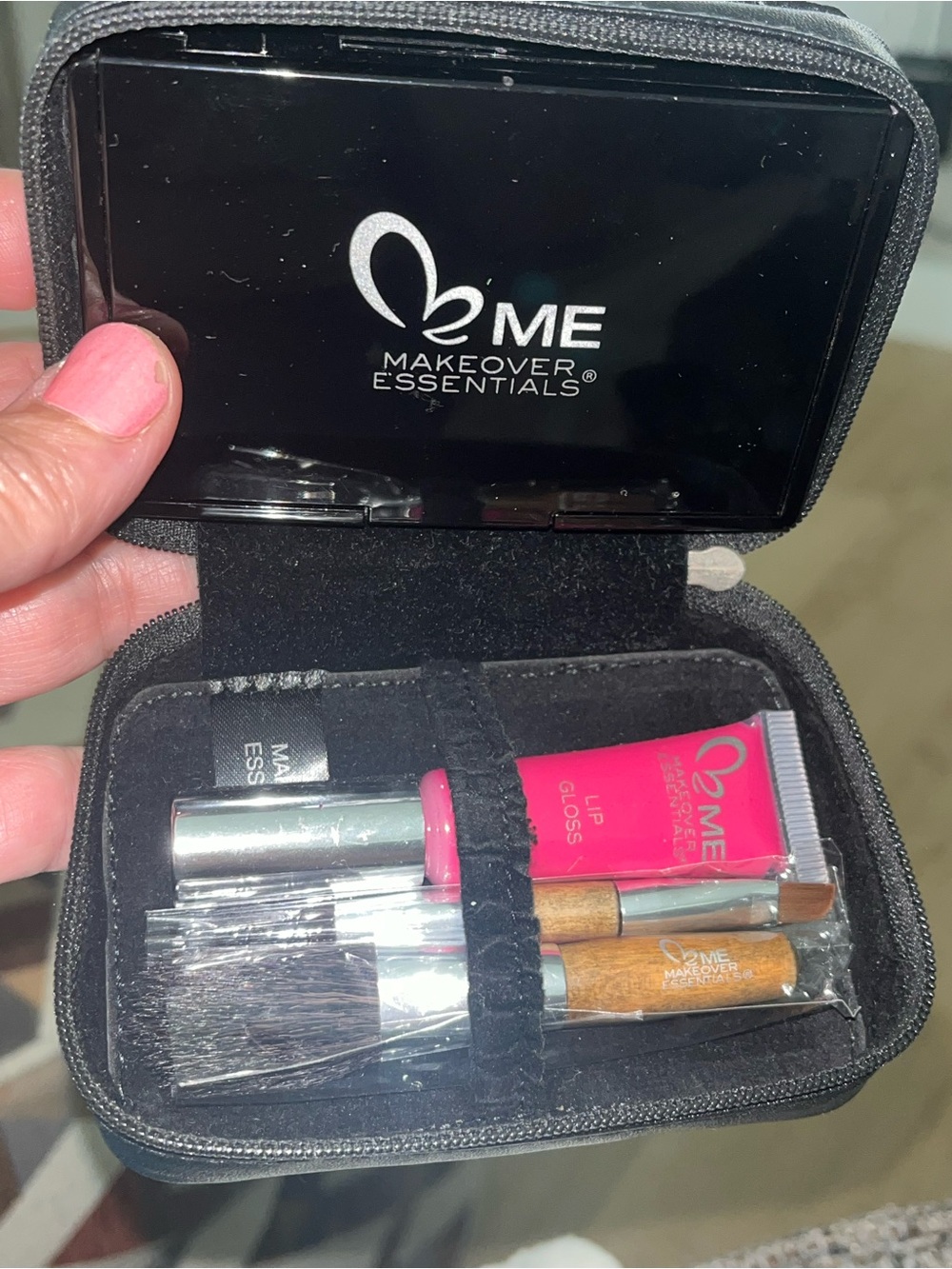 New Makeover Essentials 8
Eyeshadows With Brushes And Hot Pink Lipgloss
